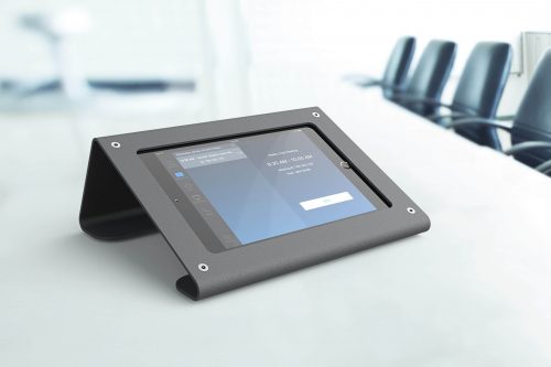 Lifestyle Image of Heckler Meeting Room Console on Conference Table with iPad Powered On